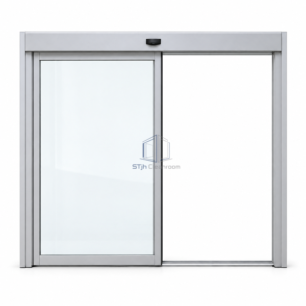 STjh single-leaf automatic sliding door on white with clear aluminum-framed glazing and a covered overhead operator.