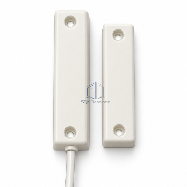 STjh surface magnetic door contact and matching rectangular magnet with mounting holes on a white background.