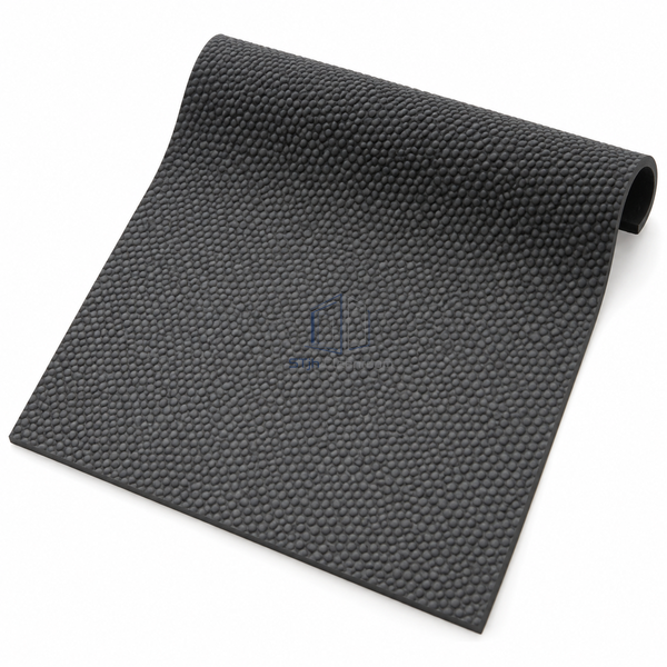 STJH R11 ultra-grip rubber sheet sample with molded textured face and exposed solid 2 mm edge on white