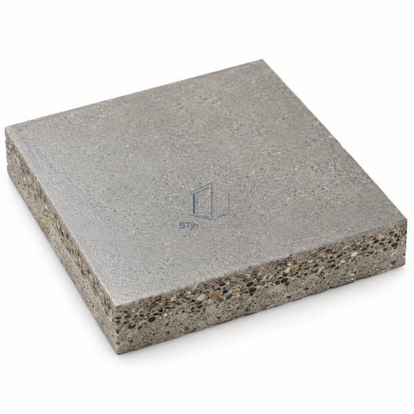 STJH SC46 cured epoxy mortar sample with a sealed face and thick compacted aggregate edge on white