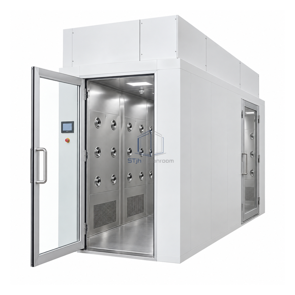 STjh deep L-shaped air shower with two internal nozzle banks and a right-side exit door near the far end