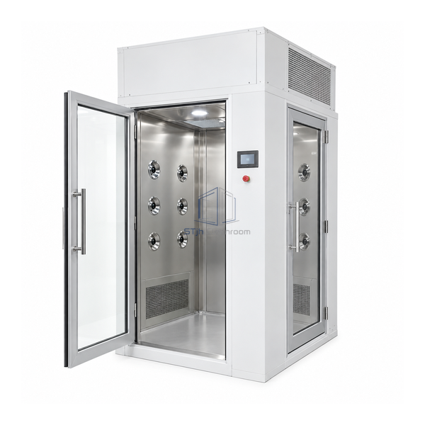 STjh compact L-shaped air shower with an open front entrance and a perpendicular glazed exit door on the right side