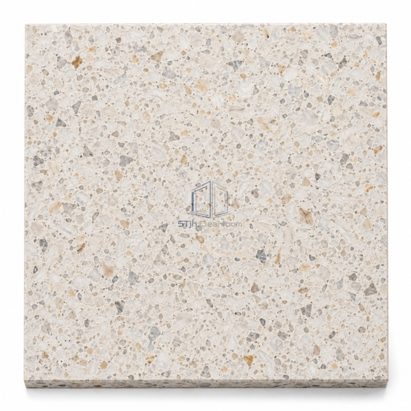 STJH fine-chip epoxy terrazzo thin cured sample with polished face and visible cut edge on white