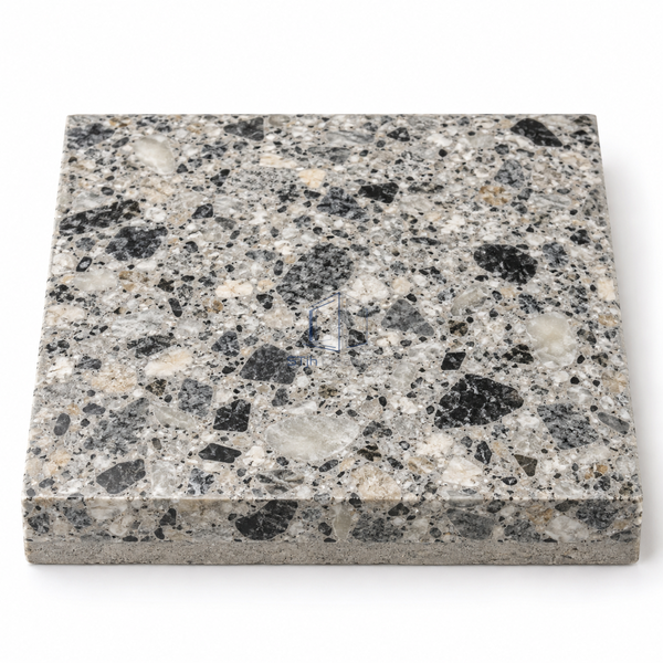 STJH granite-effect epoxy terrazzo cured sample with exposed mineral chips and full cut section on white